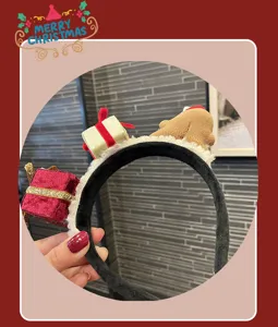 Christmas headband with gingerbread man and gift box decorations for festive holiday party.