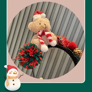 Christmas plush bear headband with Santa hat and pom poms for festive holiday party wear