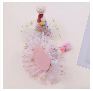 Cute kids birthday cone hat hair clip with colorful pom poms and starry mesh decoration.