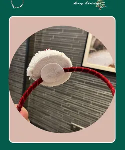 Red velvet Christmas headband with white fluffy hat decor, ideal for kids holiday party hair accessories.
