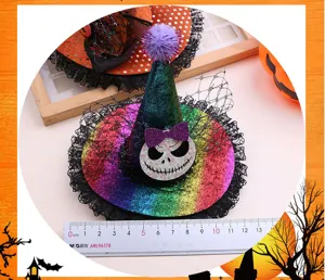 Detailed close-up of Halloween rainbow witch hat hair clip with spooky skull motif and lace.