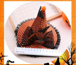Halloween mini witch hat hair clip detail view, orange polka dot mesh lace festival hair accessory.