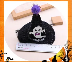 Halloween witch hat hair accessory detail shot showing cute ghost decoration and size ruler.
