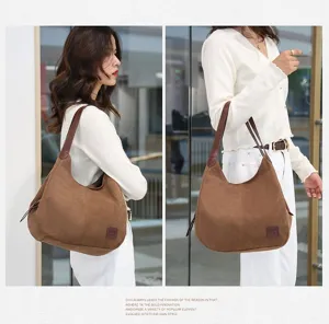 Detailaufnahme der braunen Freizeittasche aus Canvas, lässiger Hobo-Stil für den Alltag.
