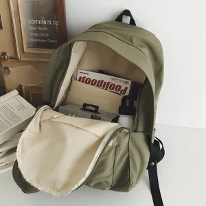 Lässiger grüner Canvas-Rucksack mit großer Kapazität für Pendeln und Reisen.