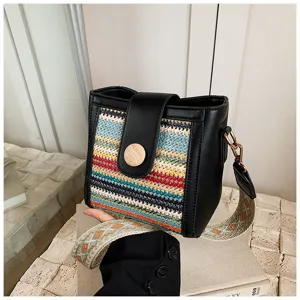 Woven bucket bag with wide strap, stylish ethnic style shoulder crossbody bag for women.