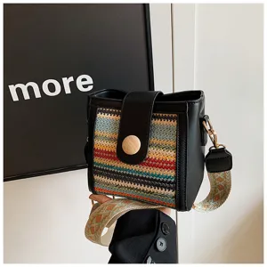 Stylish women's woven bucket shoulder bag with wide strap, trendy casual crossbody bag.
