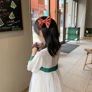 Jolie pince à cheveux nœud style coréen pour filles, accessoire de coiffure tendance au quotidien.