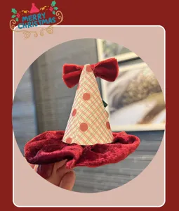 Red velvet Christmas hat hair clip detail view, mini cone bow design for holiday party hair.