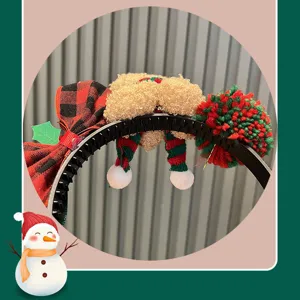 Christmas headband with plush plaid bow and cute doll legs design, perfect for holiday party wear.