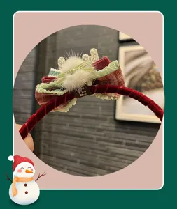 Christmas velvet bow headband with reindeer antlers, cute furry pom pom holiday hair accessory.