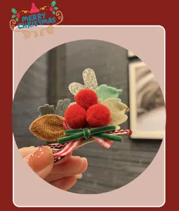 Christmas hair clip with cute pom poms, red and green bowknot design, perfect holiday hair accessory.