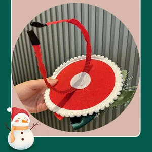 Detail view of the red Christmas hat headband showing back structure, festive party hair accessory.