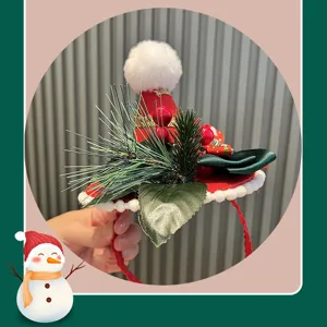 Christmas headband with mini red hat, perfect festive hair accessory for holiday photo props.