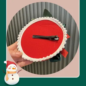 Christmas red hair clip with white pom pom edge, festive girl holiday hair accessory.