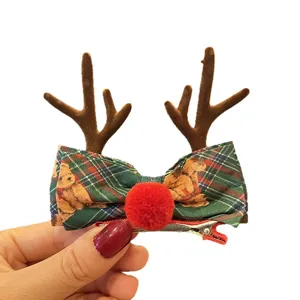 Christmas reindeer antler hair clip with cute plaid bow and red nose for kids and girls main view