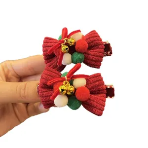 Weihnachts Haarklammern für Mädchen, rote Cord Schleife mit Bommeln und goldenen Glocken.