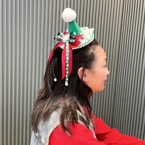 Christmas red mini Santa hat hair clip festive party hair accessory for women and girls.