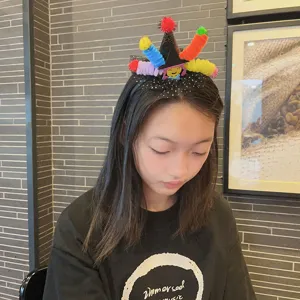 Halloween witch headband with colorful pipe cleaners and mesh, perfect party hair accessory.