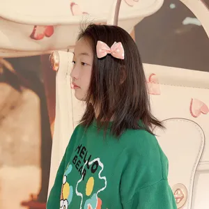 Joli pince à cheveux nœud à pois rose pour enfants, accessoire de cheveux en tissu doux.