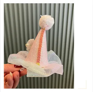 Pink cone birthday hat hair clip detail, featuring sparkly sequins, tulle and pearl.