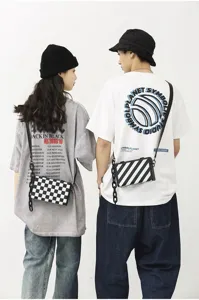 Sac bandoulière de mode unisexe, design à carreaux tendance et boîte rayée pour tous les jours.
