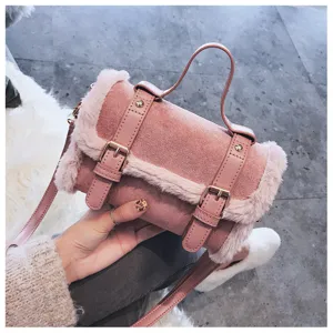 Pink plush crossbody bag detail, cute furry trim handbag, stylish autumn winter shoulder bag.