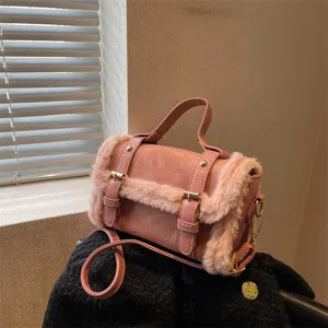 Chic pink plush crossbody bag for women, trendy autumn winter fluffy handbag with shoulder strap.