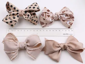 Handmade big bow hair clips for girls, Korean style ribbon hair accessories with cute patterns.