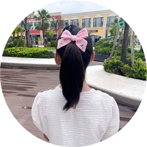 Cute kids pink gingham hair bow clip with sweet cherry embroidery, perfect daily hair accessory.