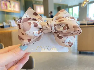 Caramel brown large bow hair clip for girls, cute bear print ribbon hairpin with display card.