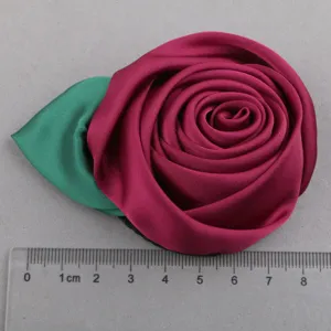 Handmade satin rose flower applique for DIY hair accessories, clothing, and brooches.