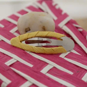 Yellow ribbon wrapped metal BB hair clip detail shot, perfect for kids accessories.