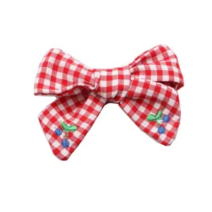 Red and white gingham hair bow clip with cute blue berry embroidery for sweet girls and kids