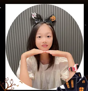 Halloween black lace headband with cute ghost and pumpkin, perfect kids costume hair accessory.