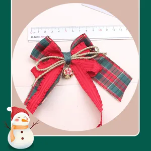 Christmas red green bow hair clip with bell, cute holiday hair accessory for girls detail view