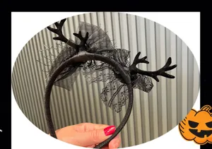 Detailed close-up of the black Halloween antler headband featuring delicate lace and mesh.