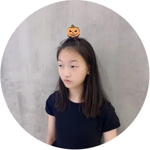 Simpatico fermaglio per capelli a zucca di Halloween per bambini, perfetto per feste.