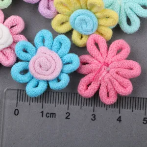 Handmade woven flower DIY accessories, colorful floral appliques for shoes and clothes detail view