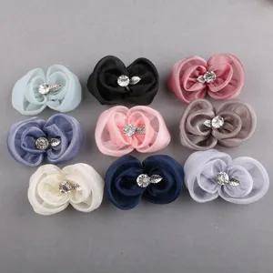 Handgemachte Organza Blumen Accessoires in vielen Farben mit glitzernden Strasssteinen.