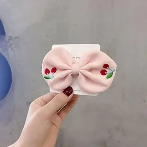 Cute kids pink bow hair clip with cherry embroidery, sweet princess hair accessory for cute girls.