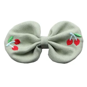 Cute cherry embroidered hair bow for kids, sweet fabric hair clip for girls daily wear.