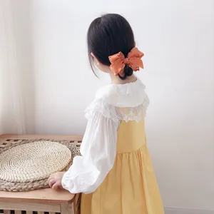 Cute kids fabric bow hair clip with ruffled design, sweet Korean style hair accessory for girls.