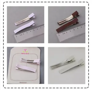 Gedetailleerd overzicht van 6.0cm ripslint verpakte dubbele tanden krokodillenklem haarspelden.