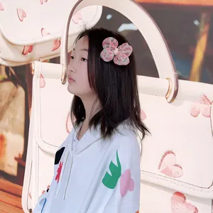 Pince à cheveux nœud floral pour filles, accessoire de princesse mignon porté par enfant