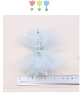 Cute blue mesh bow hair clip for girls with sparkling rhinestone crown dangle accessory.