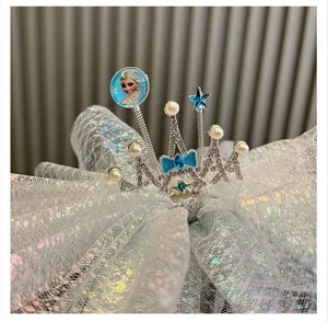 Close-up detail of blue mesh bow hair clip with rhinestone crown and princess character decor.