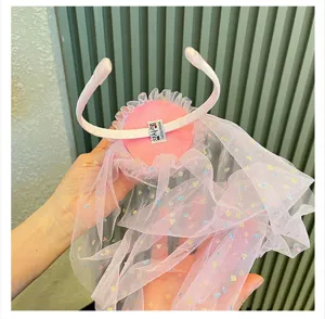 Pink kids birthday party hair hoop featuring colorful sequin mesh veil detail display.