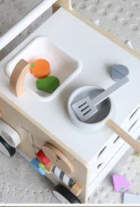 Multifunctional wooden baby walker activity center and pretend play kitchen toy for toddlers.
