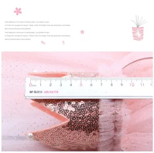 Detailed shot of pink sequined crown headband with pearls, mesh fabric, about 11cm width.